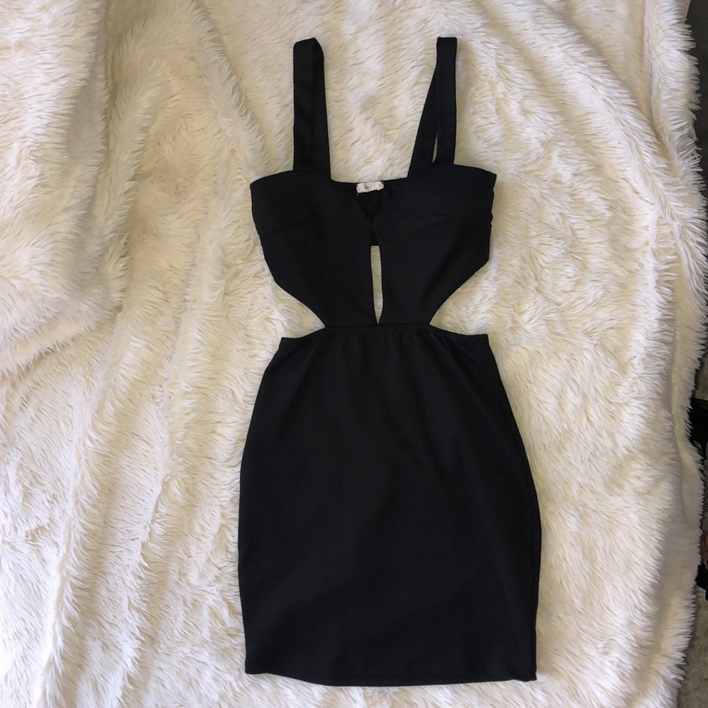 Sexy little black dress with cut outs